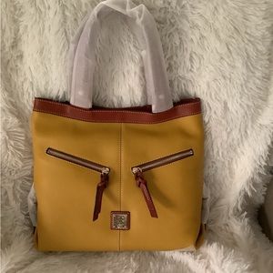 Dooney and Bourke small sara bag in the color mustard